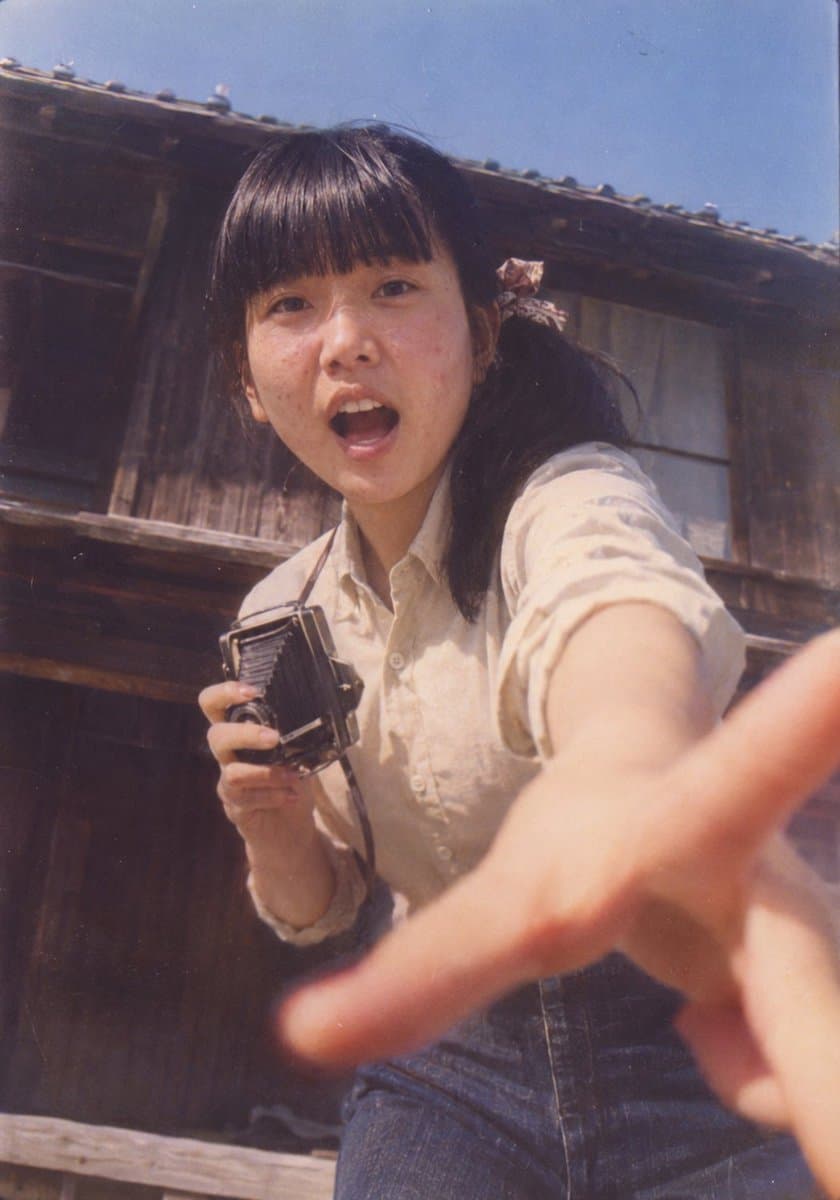 Retro Showa Girl Holding Vintage Camera
