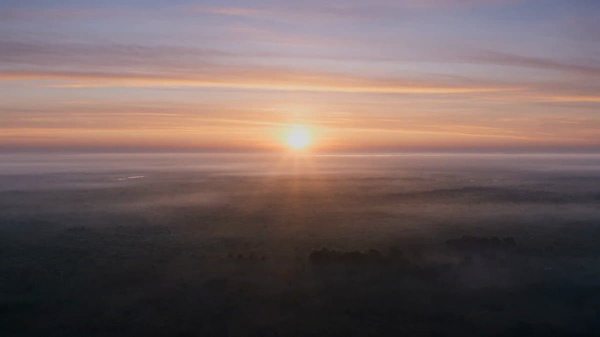 Self-Assembling City Sunrise Video Prompt